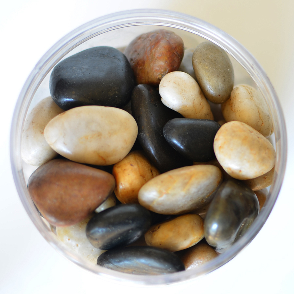 Top veiw of a jar of Mixed River Stones