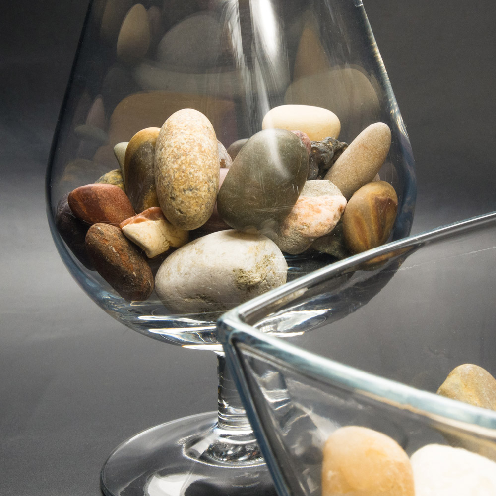 Mixed River Stones in glass vase